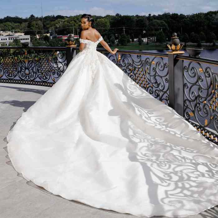 Wedding dress with buttons down the train