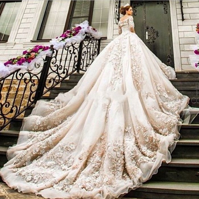 Wedding dress with buttons down the train